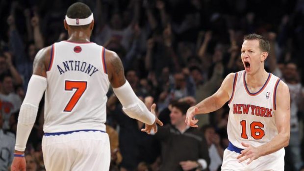 New York Knicks forward Steve Novak celebrates with forward Carmelo Anthony after he scored a three-pointer against the Miami Heat at Madison Square Garden.