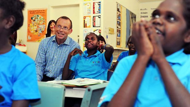 An absolute privilege: Tony Abbott visits a school in the remote indigenous community of Aurukun on the west coast of Cape York in Queensland.