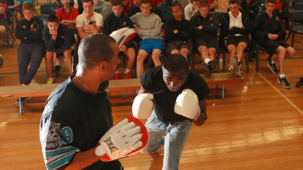 Tough lesson: Boxers Sam Soliman and Samuel Kaldjob Colomban