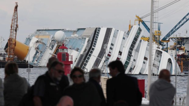 A view of the partially sunk Costa Concordia wreckage next to Italy's Giglio Island.