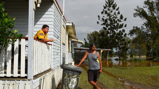 "We had nowhere to go": Phillip Roberts (left) and Brandan Harrington (right) at their home on the banks of the Wilsons River at Wyrallah.