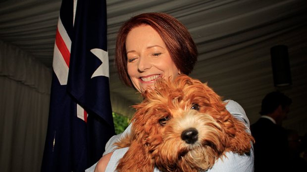 Canoodling with her cavoodle ... Julia Gillard with Reuben.