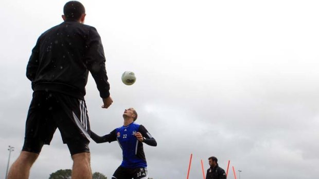 Down to it ... Jamie Coyne at a Sydney FC training session.