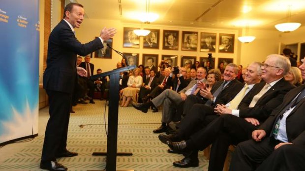 Opposition Leader Tony Abbott during a meeting with Coalition members in the party room at Parliament House.