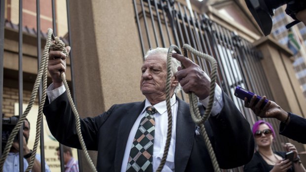 A man that called himself 'Mr Noose' who wants to see justice to crimes against women arrives at North Gauteng High Court.