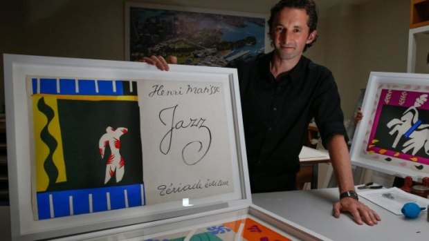 Justin Paton, head of International Art at the Art Gallery of NSW, with Matisse's limited-edition artist's book, <i>Jazz</i>, from 1947.