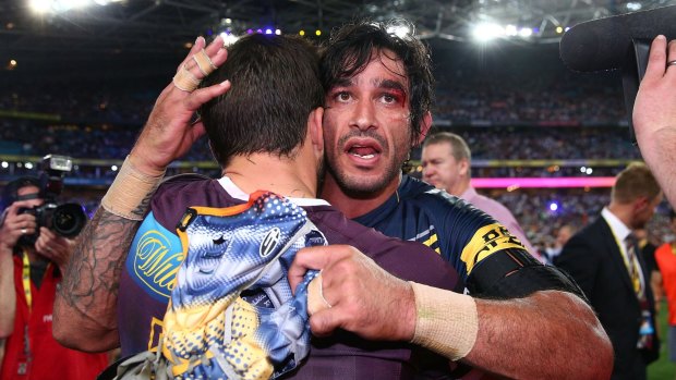 Immortal credentials: Johnathan Thurston after his match-winning effort embraces Ben Hunt.