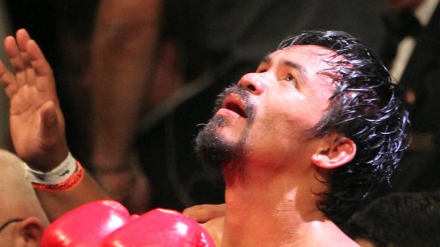 Manny Pacquiao reacts after his fight against Timothy Bradley.