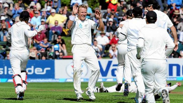 New Zealand bowler Neil Wagner celebrates after he dismisses Ian Bell.