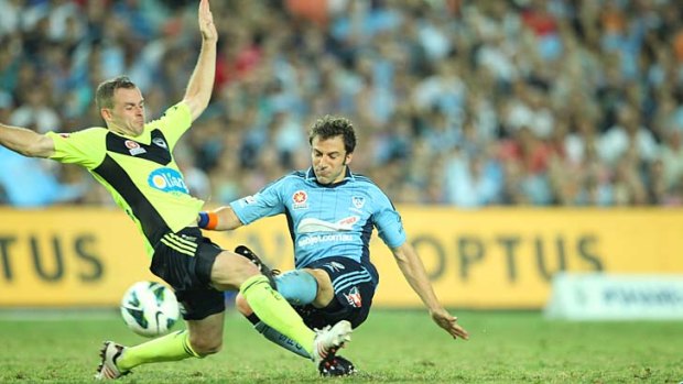 Caught: Alessandro Del Piero (right) is tackled by Leigh Broxham.