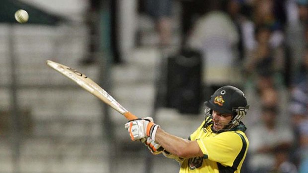 Sealed with a six ... Michael Hussey anchors Australia to victory.