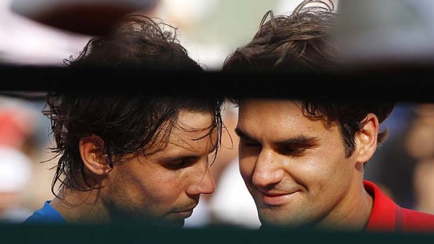 Rafael Nadal shakes hands with Roger Federer after winning their men's final at the French Open this year.