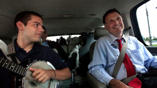 Then-gubernatorial candidate Creigh Deeds spends time with his son Gus, left, on the road to Halifax, Virginia in 2009. Virginia State Police confirmed Mr Deeds was stabbed multiple times and his son Gus, 24, was shot and killed on Tuesday.