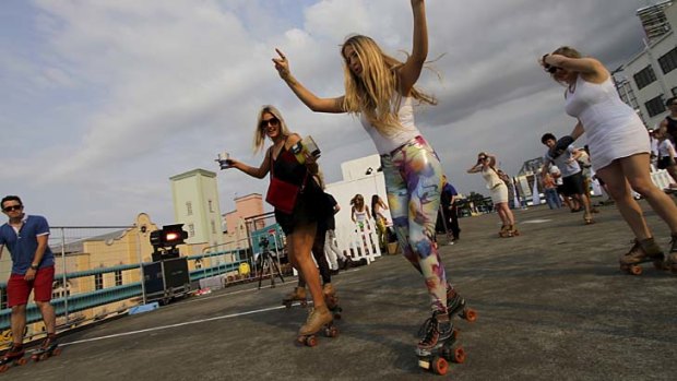 Retro ... a rooftop roller disco in Brisbane yesterday.