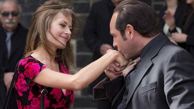 Charming rogue: Madeleine West as Danielle McGuire and Robert Mammone as Tony Mokbel in <i>Fat Tony & Co</i>.