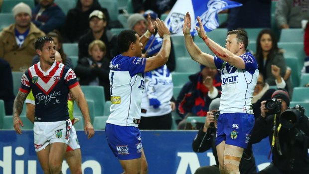High-five: The Bulldogs are making their trademark charge to September.