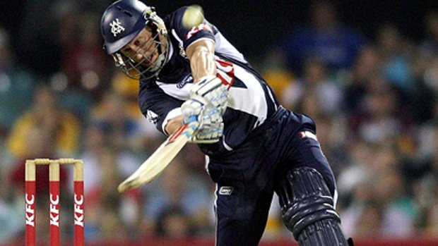 Free swinging ...  Victoria's David Hussey unleashes an almighty shot at the Gabba last night.