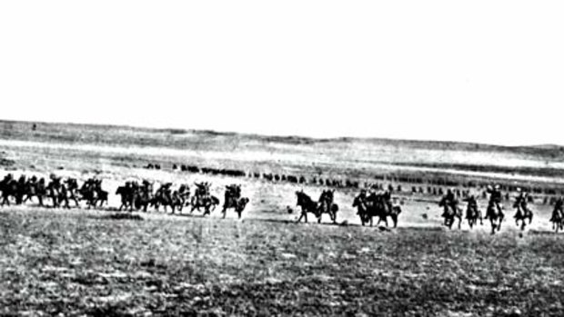 The battle rages . . . men on horseback raced across six kilometres of open ground during the Charge of Beersheba.  The Australian War Memorial believes this photograph, its authenticity debated for 60 years, was taken during a re-enactment of the charge staged about five months after the event.