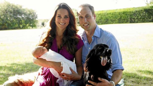 Kate and William with baby George and the couple's dogs.