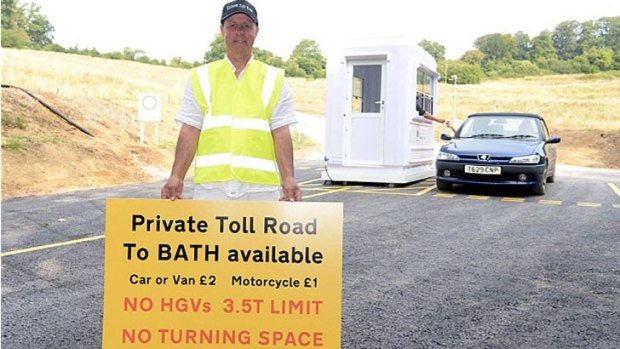 Mike Watts on his newly-built toll road in England.