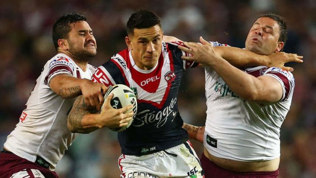 D is for defence: Sonny Bill Williams tries to bust the Manly line during the Roosters' 4-0 qualifying final win over Manly.