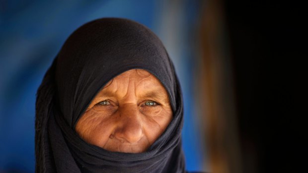Syrian refugee Em Muhammed, 62, in her tent at a Syrian refugee camp in Hosh Hareem, Bekaa Valley, east Lebanon.