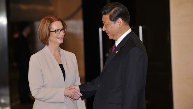 Julia Gillard being welcomed to the Boao Forum by Xi Jinping, President of the People's Republic of China.