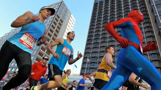 Super heroes: A competitor dressed as Spider-Man mixes in with those in more regular attire.
