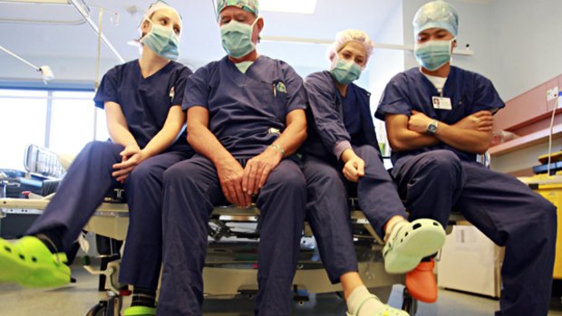 Among the 30 per cent of Epworth Hospital staff who wear Crocs during surgery are, from left, Yvonne Lander, William Barker, Cassandra Darmos and Andrei Cortez.