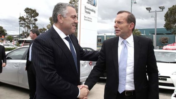 Tony Abbott and Joe Hockey visit a Victorian Toyota dealership during the 2013 election campaign.