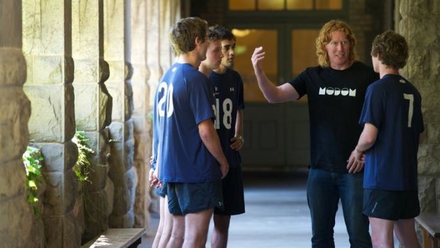 Cat tales: Geelong champion Cameron Ling chats with a group of young hopefuls at the AIS-AFL Academy.