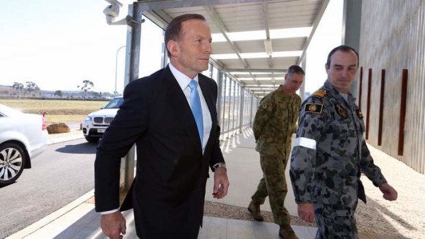 Prime Minister Tony Abbott at the Headquarters Joint Operations Command with Vice-Admiral David Johnstone, chief of Joint Operations.