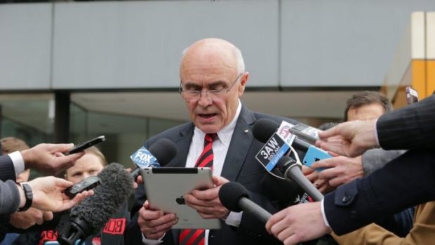Paul Little fronts the 'post-match' press conference outside the Federal Court.