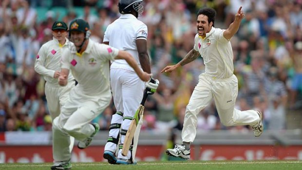 Early wicket ....  Mitchell Johnson after removing Michael Carberry.