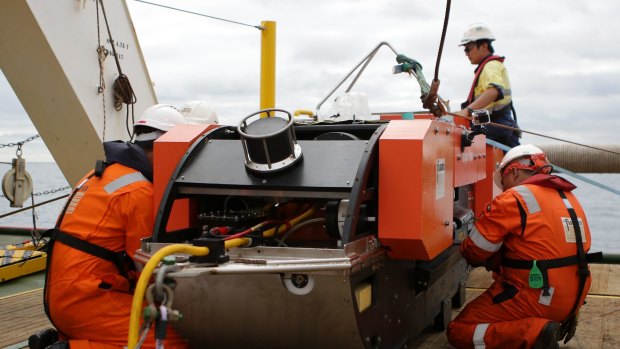 Last checks are done on the Dragon Prince deep tow fish prior to deploying it behind Fugro Discovery.