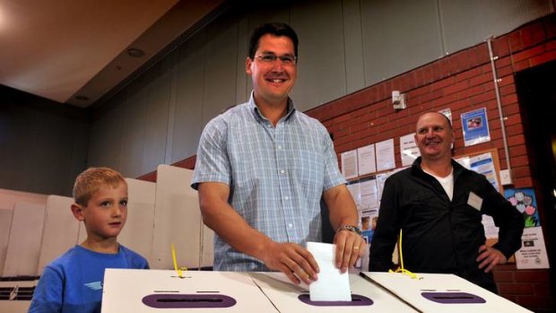 ACT Liberal leader Zed Seselja casts his vote.