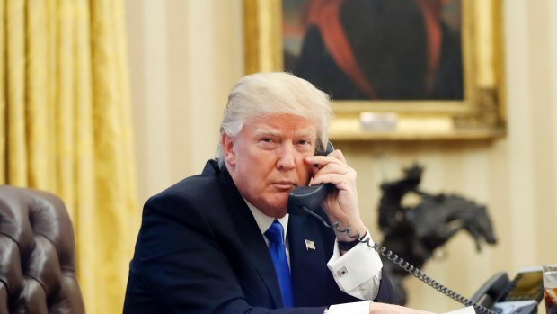 President Donald Trump speaks on the phone with Malcolm Turnbull.