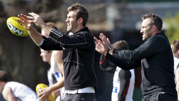 Eyes on the prize: Travis Cloke (left) with forward coach Anthony Rocca.