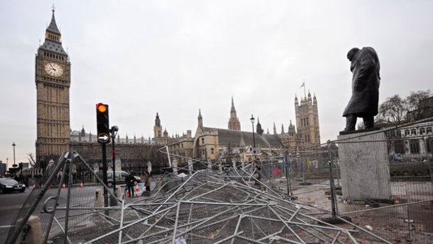 Damaged security barriers under the statue of Winston Churchill, at Westminster.