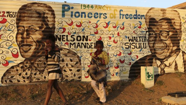 A Soweto mural of Nelson Mandela and fellow anti-apartheid activist Walter Sisulu, painted by Siyabonga Mbola.