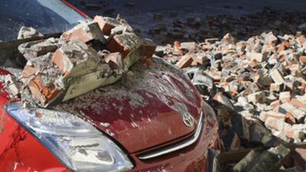 A quake-damaged car is pictured in Christchurch.