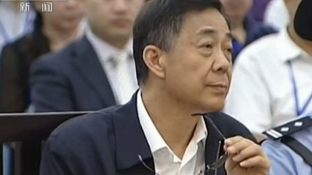 Bo Xilai looking on as he stands on trial at the Intermediate People's Court in Jinan, east China's Shandong province.