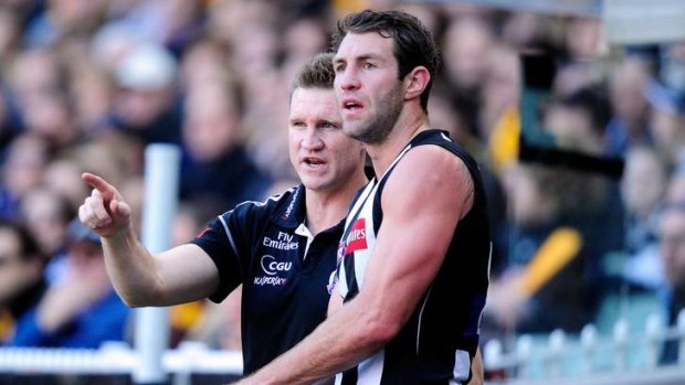 GWS target ... Travis Cloke with Collingwood coach Nathan Buckley.