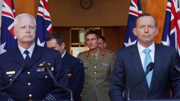Lieutenant General Angus Campbell (centre) was announced as the new Chief of Army by Prime Minister Tony Abbott on Thursday.