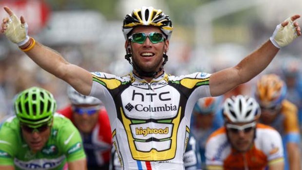Stage winner ... Mark Cavendish celebrates his fifth victory of the Tour.