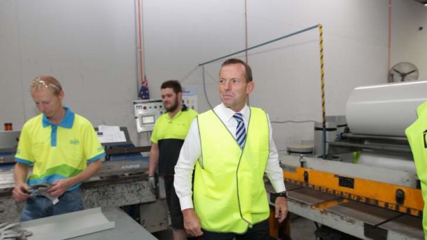 Opposition Leader Tony Abbott visits a building supplies business in Canberra.