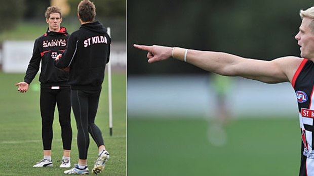 Nick Dal Santo (left) and Nick Riewoldt  point the way at training.
