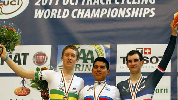 Edwin Alcibiades Avila (centre) of Colombia is flanked by Cameron Meyer (left) of Australia and Morgan Kneisky of France during the medal ceremony for the Men's Points Race.