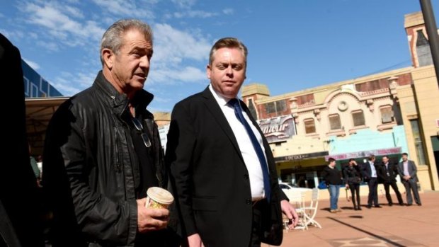 Directing again: Mel Gibson with Industry, Resources and Energy Minister Anthony Roberts.