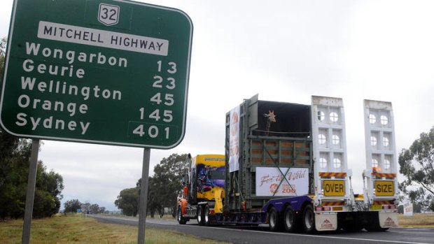 Big city lights ... Kitoto the giraffe heads for Sydney in her custom-built travelling crate.